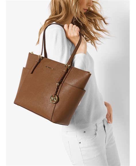 michael kors east west top zip tote luggage|Michael Kors jet top zip tote.